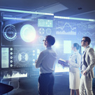 People looking at futuristic screen